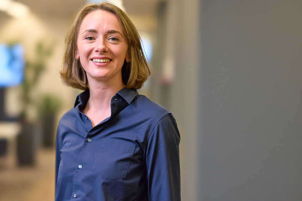 Youn women standing in an office